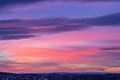 Beautiful red-blue, purple sunset over the night city. Bright orange sunset over the city silhouette. Artistically blurry. Russia Royalty Free Stock Photo