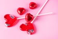 Beautiful Red Chocolate Hearts Red Lollipop Shape of Heart on Pink Background St Valentine Day Background Dessert
