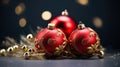 Beautiful red Christmas balls decorated with gold on black background with bokeh, close-up, selective focus Royalty Free Stock Photo