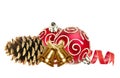 Beautiful red Christmas balls, golden bells and pine cone Royalty Free Stock Photo