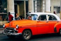 A beautiful red classic car in Havana city, Cuba. Royalty Free Stock Photo