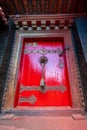 Beautiful Red door Tashilhunpo Monastery Tibet, China Royalty Free Stock Photo