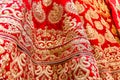 Beautiful red dress with traditional embroidery in the street cloth shop Royalty Free Stock Photo