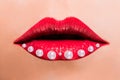 Beautiful red female lips with pearls Royalty Free Stock Photo