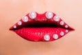 Beautiful red female lips with pearls Royalty Free Stock Photo