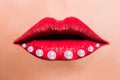 Beautiful red female lips with pearls Royalty Free Stock Photo