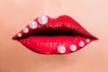 Beautiful red female lips with pearls Royalty Free Stock Photo