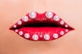 Beautiful red female lips with pearls Royalty Free Stock Photo