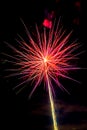 A Red Fireworks Burst in the Sky Royalty Free Stock Photo