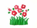 Beautiful bloom flower plasticine clay, red floral dough, green grass