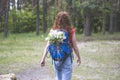 Beautiful red hair woman tourist with backpack looking for the way Royalty Free Stock Photo