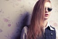 Beautiful red-haired fashion model in retro sunglasses Royalty Free Stock Photo