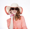 Beautiful red-haired girl in hat at white background Royalty Free Stock Photo