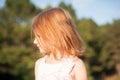 Red-haired girl in profile