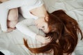 Beautiful red-haired girl sleep on the bed Royalty Free Stock Photo