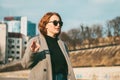 A beautiful red-haired woman smiles and talking