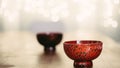 Beautiful red handmade Urushi dish. Japanese lacquered tableware on a blurry background Royalty Free Stock Photo