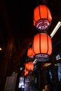Beautiful red lanterns in China. night street decorated with lanterns.