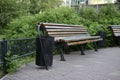 Beautiful red modern park benches in the evening Royalty Free Stock Photo