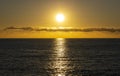 Beautiful, red orange dawn on the mediterranean sea. The rays of the sun through the fog. The blue sky over the mediterranean sea Royalty Free Stock Photo