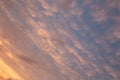 Beautiful red, pink. blue unusual feather clouds against the sky in sunrise, sunset, climate change, global warming