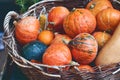 Red pumpkins in a wicker basket