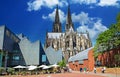 Beautiful red square, modern Ludwig museum, KÃÂ¶lner Dom cathedral, blue summer sky
