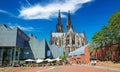 Beautiful red square, modern Ludwig museum, KÃÂ¶lner Dom cathedral, blue summer sky