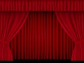 Beautiful red theatre folded curtain drapes on black background