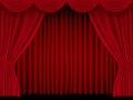 Beautiful red theatre folded curtain drapes on black stage