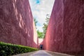 Beautiful red unique walkway wall with abstract texture all around