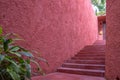 Beautiful red unique walkway wall with abstract texture all around