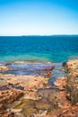 Beautiful Red Volcanic Rock on Lake Superior Royalty Free Stock Photo