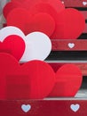 Beautiful Red and white heart shape made from corrugated plastic sheets decorate on the stairs on the occasion of the Valentine`