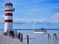 Red-white lighthouse on Lake Neusiedlersee in Podersdorf, Austria