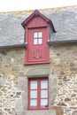 Beautiful red window in France, as if opening to new horizons