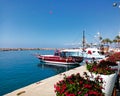 Beautiful red yacht and flowersin Side Royalty Free Stock Photo