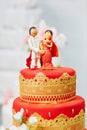 Beautiful red and yellow wedding cake in Indian style Royalty Free Stock Photo