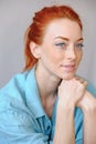 Beautiful redhead freckled cheerful woman smiling thoughtful Royalty Free Stock Photo