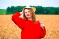 Beautiful redhead girl in wheat field Royalty Free Stock Photo