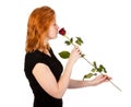 Beautiful redhead woman with rose Royalty Free Stock Photo