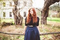 Beautiful redhead young woman outdoor portrait Royalty Free Stock Photo