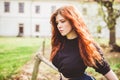 Beautiful redhead young woman outdoor portrait Royalty Free Stock Photo