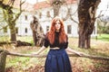 Beautiful redhead young woman outdoor portrait Royalty Free Stock Photo