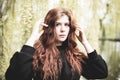 Beautiful redhead young woman outdoor portrait Royalty Free Stock Photo