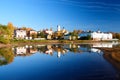 Beautiful reflection of the city in the water of Volga river