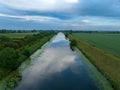 Beautiful reflection of the cloudy sky on the Witham river Royalty Free Stock Photo