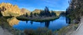Beautiful mountain reflections in Crooked River in Smith Rock State Park Royalty Free Stock Photo