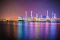 Beautiful reflection of Oil refineries located along the river with dark sky background-Image Royalty Free Stock Photo