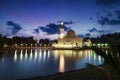 Beautiful reflection of Tengku Tengah Zaharah Mosque over sunrise background, most iconic floating mosque located at Terengganu M Royalty Free Stock Photo